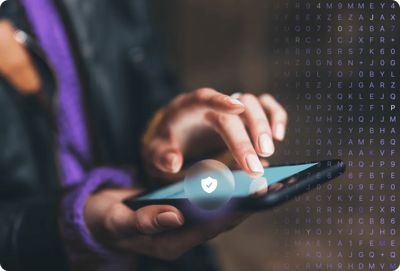 Person using a phone with a digital privacy shield